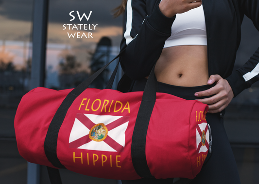 You will love Stately Wear's Florida Flag Hippie duffel bag. Katie Couric Shop partner. Perfect accessory as a beach bag, ski bag, travel bag & gym or yoga bag.  Custom made one-at-a-time.  Environmentally friendly.  Biodegradable inks & dyes.  Good for the planet. 2 sizes to choose.