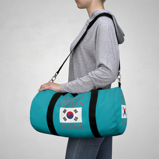 You will love Stately Wear's South Korean Flag Hippie™ duffel bag. Katie Couric Shop partner. Perfect accessory as a beach bag, ski bag, travel bag & gym or yoga bag.  Custom made one-at-a-time.  Environmentally friendly.  Biodegradable inks & dyes.  Good for the planet. 2 sizes to choose.