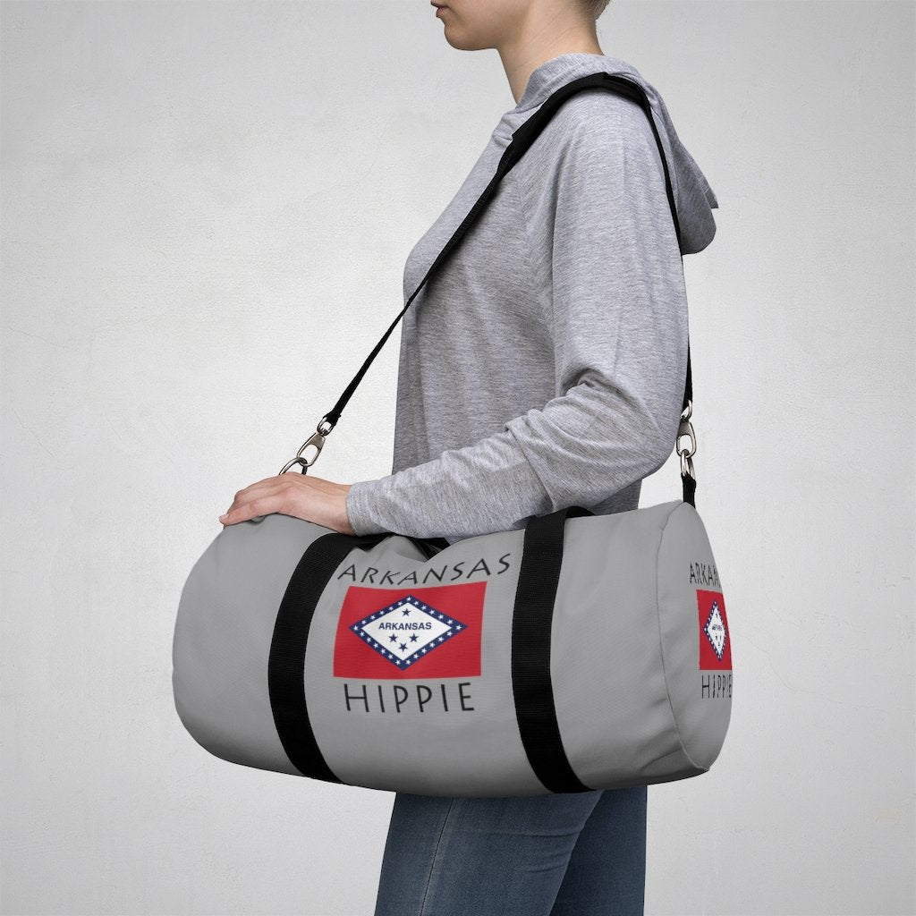 Stately Wear's Arkansas Flag Hippie duffel bag is colorful, iconic and stylish. We are a Katie Couric Shop partner. This duffel bag is the perfect accessory as a beach bag, ski bag, travel bag, shopping bag & gym bag, Pilates bag or yoga bag. Custom made one-at-a-time with environmentally friendly biodegradable inks & dyes. 2 sizes to choose.  Stately Wear's bags are very durable, soft and colorful duffel bags.