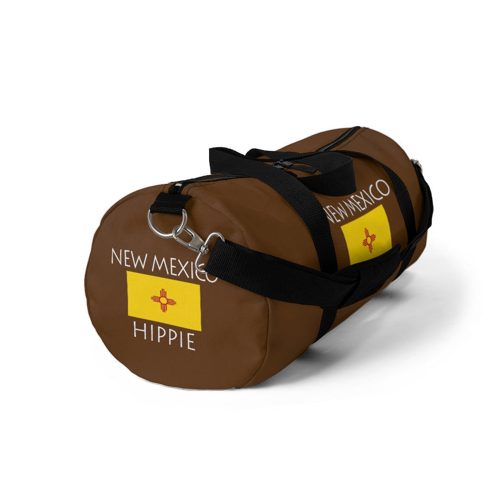 You will love Stately Wear's New Mexico Flag Hippie™ duffel bag. Katie Couric Shop partner. Perfect accessory as a beach bag, ski bag, travel bag & gym or yoga bag.  Custom made one-at-a-time.  Environmentally friendly.  Biodegradable inks & dyes.  Good for the planet. 2 sizes to choose.