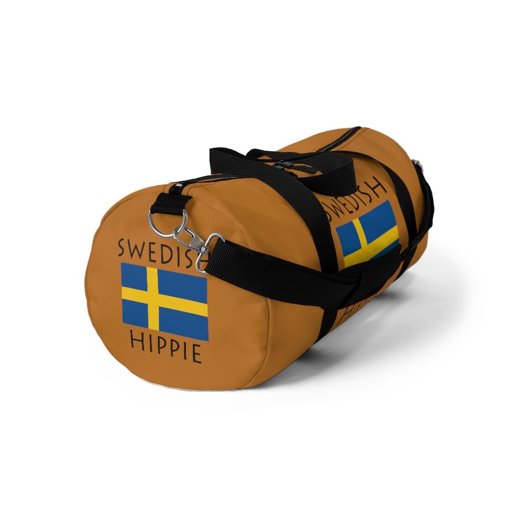 You will love Stately Wear's Swedish Flag Hippie™ duffel bag. Katie Couric Shop partner. Perfect accessory as a beach bag, ski bag, travel bag & gym or yoga bag.  Custom made one-at-a-time.  Environmentally friendly.  Biodegradable inks & dyes.  Good for the planet. 2 sizes to choose.