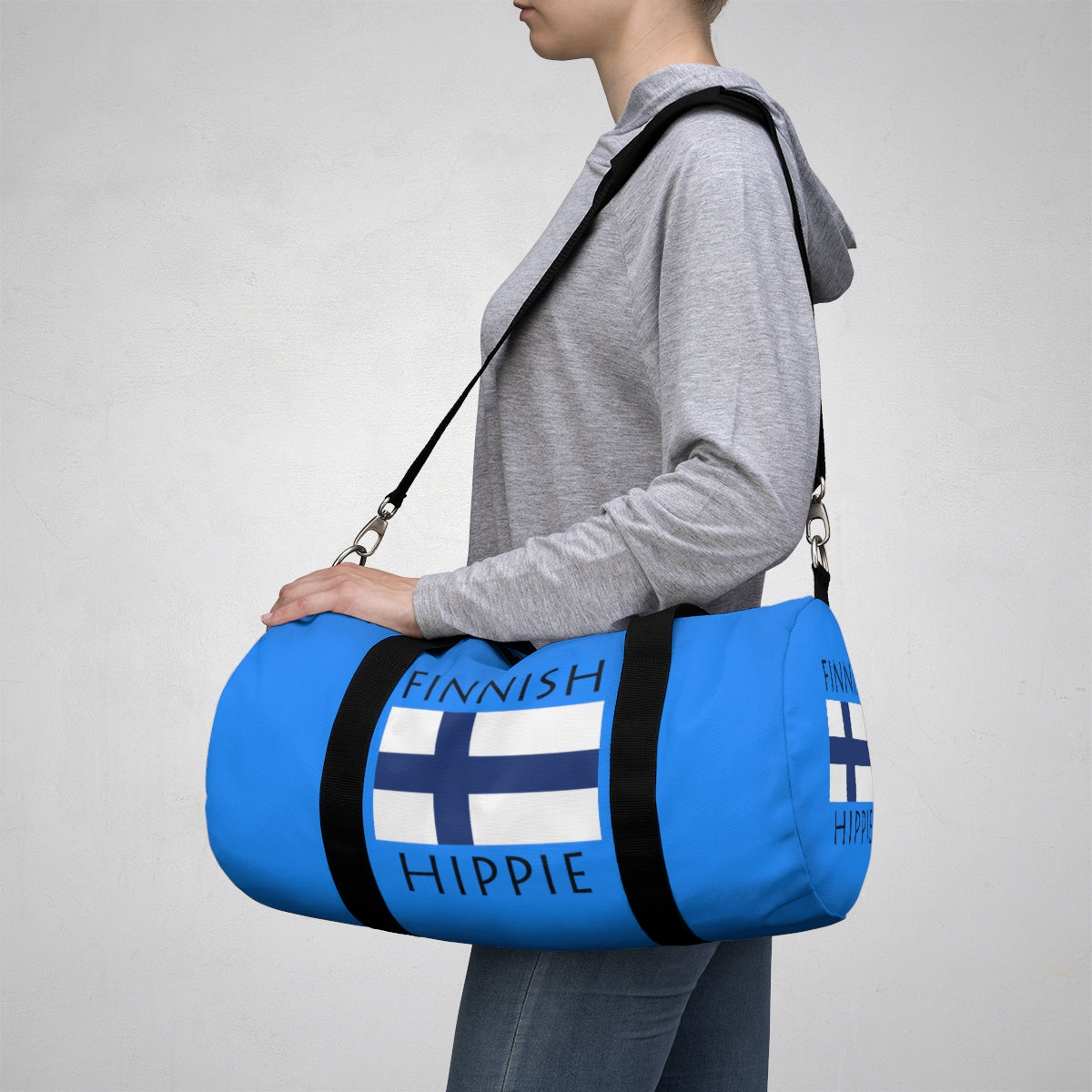 Stately Wear's Finnish Flag Hippie duffel bag is colorful, iconic and Boho stylish. We are a Katie Couric Shop partner. This duffel bag is the perfect accessory as a beach bag, ski bag, travel bag, shopping bag & gym bag, Pilates bag or yoga bag. Custom made one-at-a-time with environmentally friendly biodegradable inks & dyes. 2 sizes to choose. Stately Wear's bags are very durable, soft and colorful duffels with durable strap.