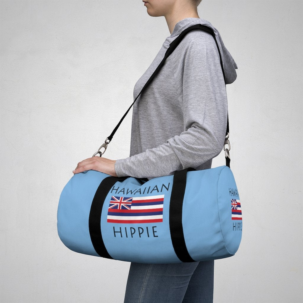 You will love Stately Wear's Hawaiian Flag Hippie duffel bag. Katie Couric Shop partner. Perfect accessory as a beach bag, ski bag, travel bag & gym or yoga bag.  Custom made one-at-a-time.  Environmentally friendly.  Biodegradable inks & dyes.  Good for the planet. 2 sizes to choose.