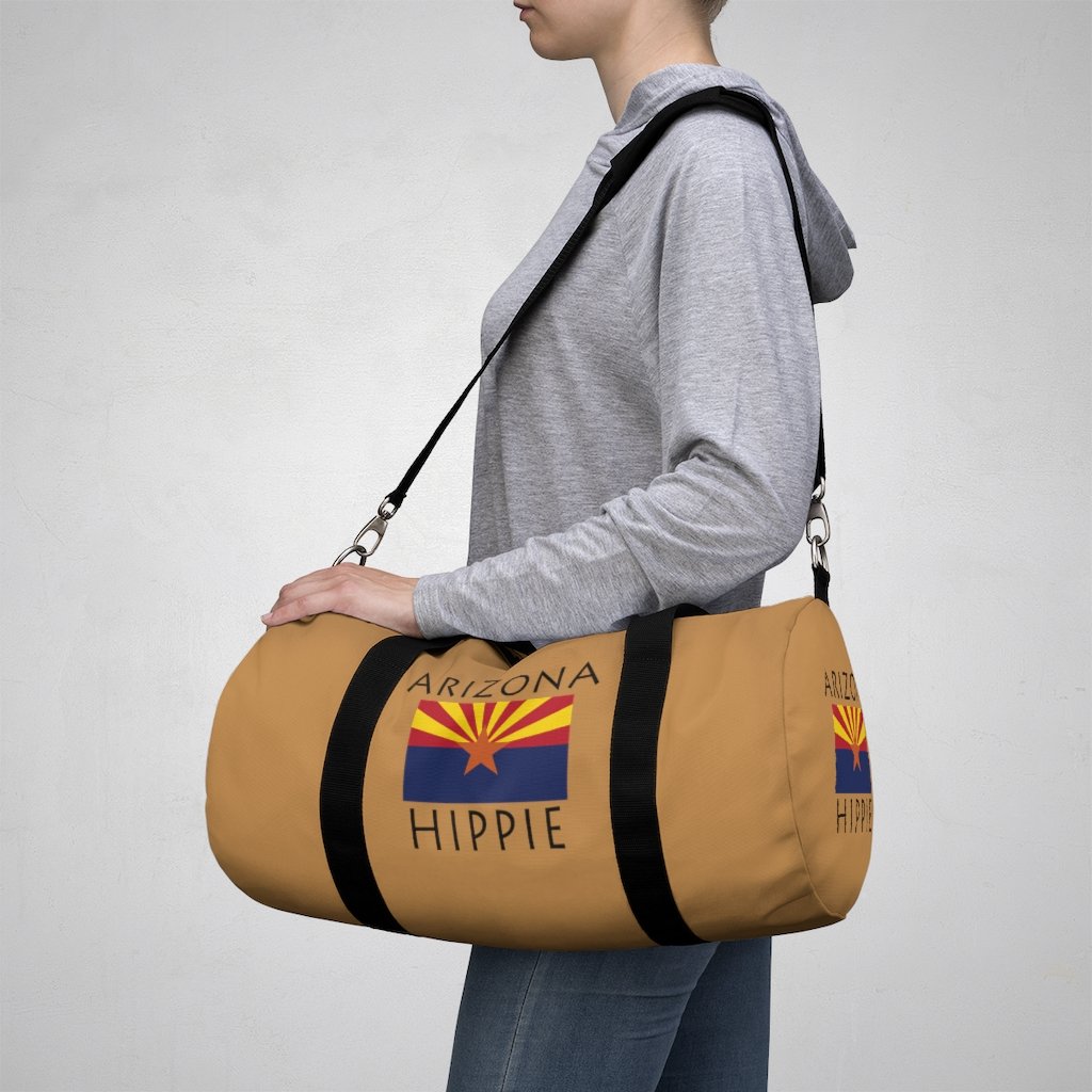 Stately Wear's Arizona Flag Hippie duffel bag. We are a Katie Couric Shop partner. The perfect accessory as a beach bag, ski bag, travel bag & gym or yoga bag. Custom made one-at-a-time. 2 sizes to choose.