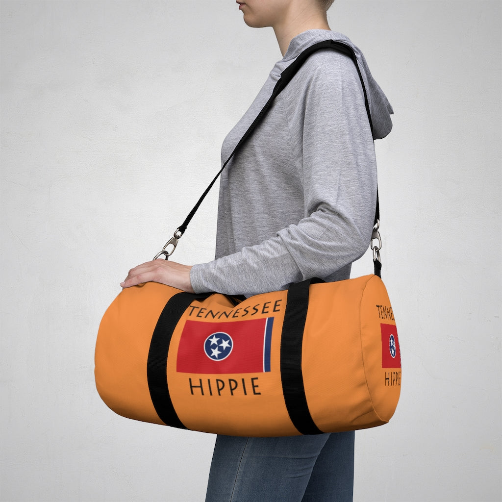 You will love Stately Wear's Tennessee Flag Hippie™ duffel bag. Katie Couric Shop partner. Perfect accessory as a beach bag, ski bag, travel bag & gym or yoga bag.  Custom made one-at-a-time.  Environmentally friendly.  Biodegradable inks & dyes.  Good for the planet. 2 sizes to choose.