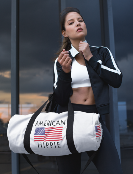 Stately Wear's American Flag Hippie duffel bag.  We are a Katie Couric Shop partner. The perfect accessory as a beach bag, ski bag, travel bag & gym or yoga bag.  Custom made one-at-a-time.  2 sizes to choose.