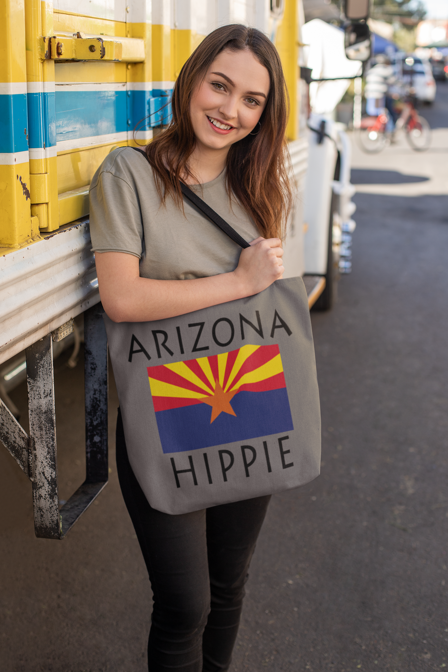 The Stately Wear Arizona Flag Hippie tote bag has bold colors from the Arizona flag.  Environmentally friendly tote bag made with biodegradable inks & dyes and made one-at-a-time.  3 practical sizes so it is a great gym bag, beach bag, yoga bag, Pilates bag and travel bag.