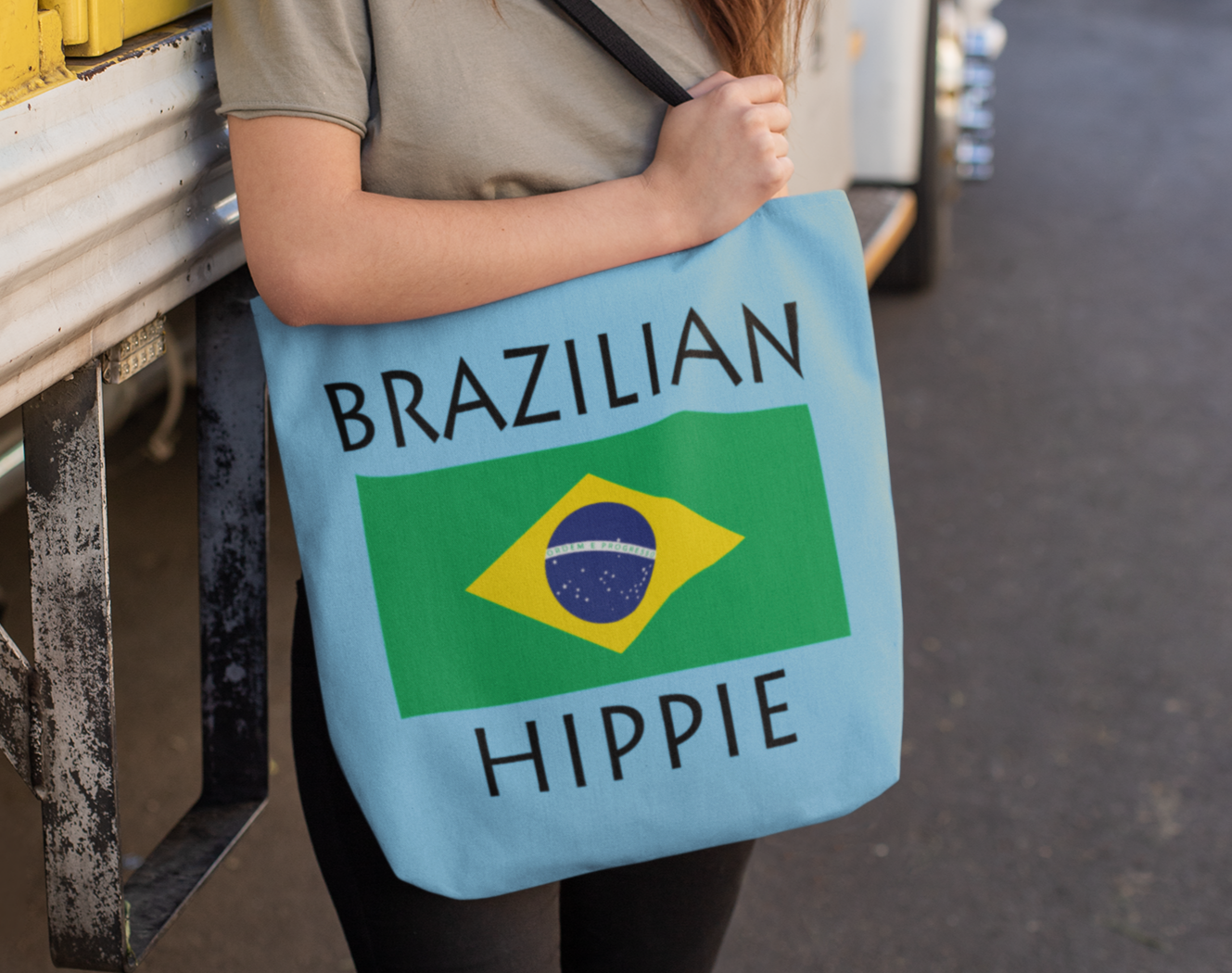 The Stately Wear Brazilian Flag Hippie tote bag has bold colors from the Brazilian flag.  Environmentally friendly tote bag made with biodegradable inks & dyes and made one-at-a-time.  Available in 3 sizes so it is perfect as a great gym bag, beach bag, yoga bag, Pilates bag and travel bag.