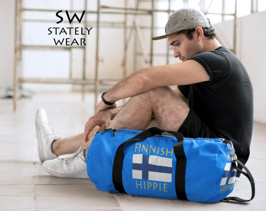 Stately Wear's Finnish Flag Hippie duffel bag is colorful, iconic and Boho stylish. We are a Katie Couric Shop partner. This duffel bag is the perfect accessory as a beach bag, ski bag, travel bag, shopping bag & gym bag, Pilates bag or yoga bag. Custom made one-at-a-time with environmentally friendly biodegradable inks & dyes. 2 sizes to choose. Stately Wear's bags are very durable, soft and colorful duffels with durable strap.
