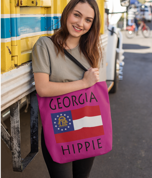 The Stately Wear Georgia Flag Hippie tote bag has bold colors from the iconic Gerogia flag. Made with biodegradable inks & dyes and made one-at-a-time it is environmentally friendly. 3 different sizes to choose from. It is a great gym bag, beach bag, yoga bag, Pilates bag and travel bag.