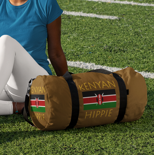 You will love Stately Wear's Kenyan Flag Hippie duffel bag. Katie Couric Shop partner. Perfect accessory as a beach bag, ski bag, travel bag & gym or yoga bag.  Custom made one-at-a-time.  Environmentally friendly.  Biodegradable inks & dyes.  Good for the planet. 2 sizes to choose.