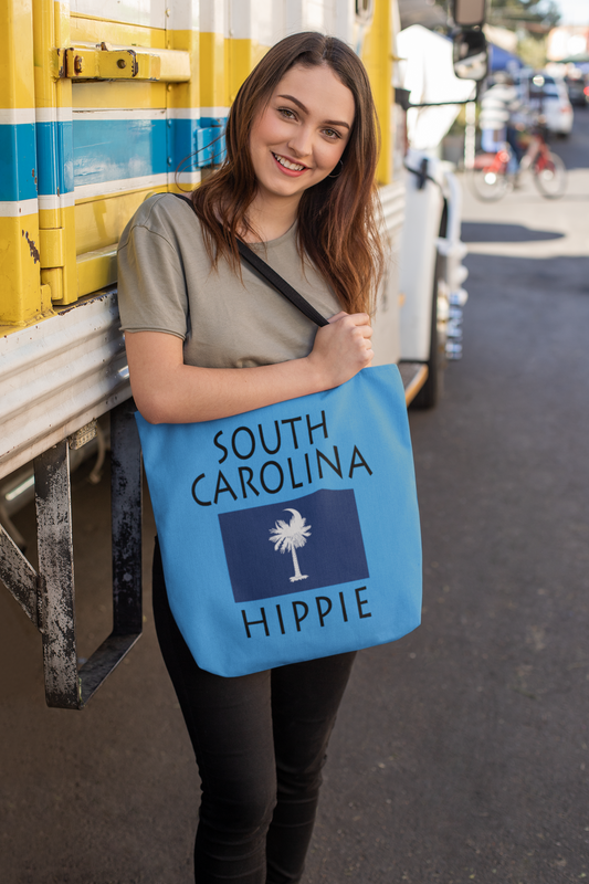  The Stately Wear South Carolina Flag Hippie tote bag has bold colors from the iconic South Carolina flag. Made with biodegradable inks & dyes and made one-at-a-time it is environmentally friendly. 3 different sizes to choose from so it is a great gym bag, beach bag, yoga bag, Pilates bag and travel bag.