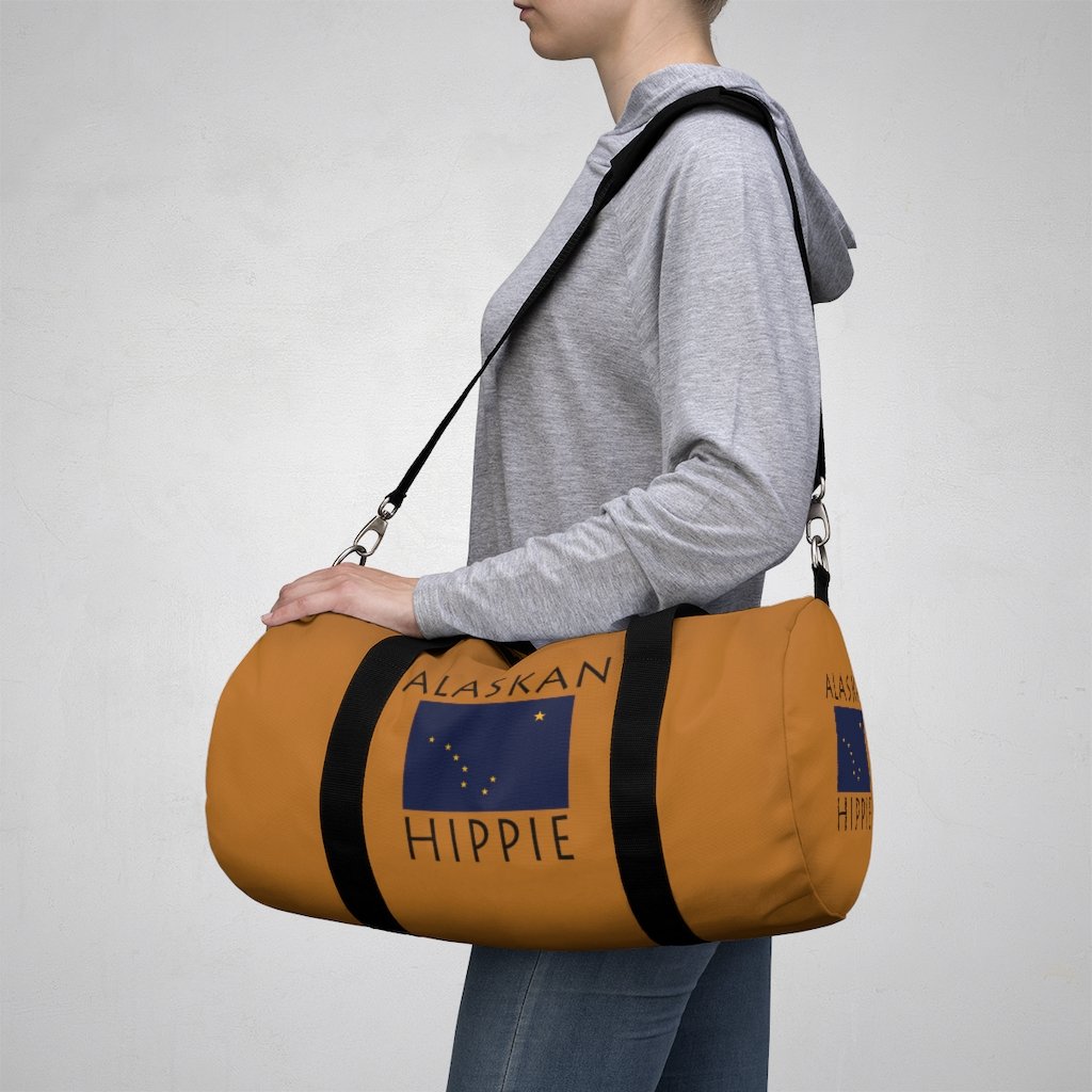 Stately Wear's Alaskan Flag Hippie duffel bag. We are a Katie Couric Shop partner. Perfect accessory as a beach bag, ski bag, travel bag & gym or yoga bag. Custom made one-at-a-time. 2 sizes to choose.