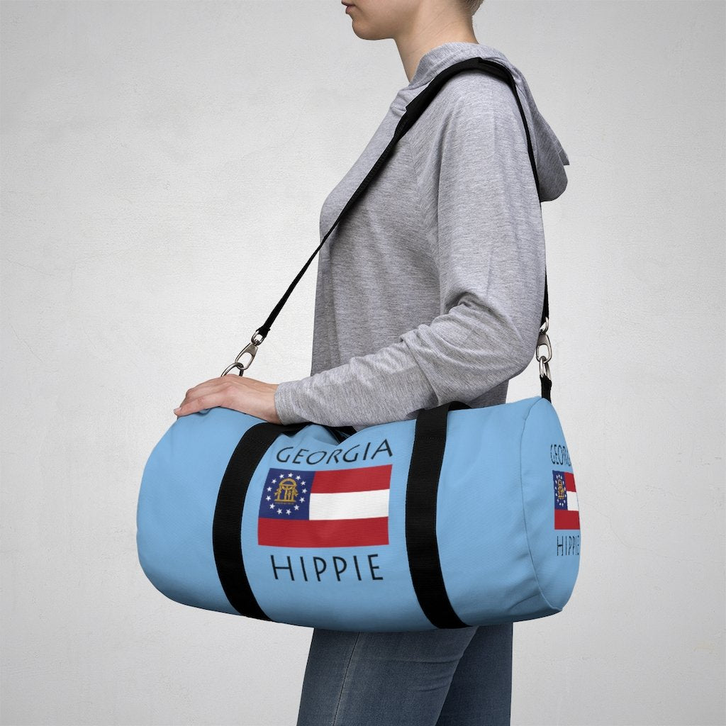 You will love Stately Wear's Georgia Flag Hippie duffel bag. Katie Couric Shop partner. Perfect accessory as a beach bag, ski bag, travel bag & gym or yoga bag.  Custom made one-at-a-time.  Environmentally friendly.  Biodegradable inks & dyes.  Good for the planet. 2 sizes to choose.