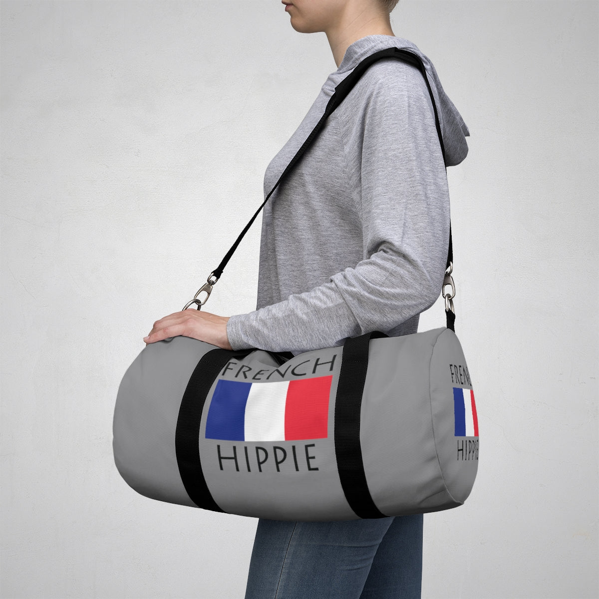 You will love Stately Wear's French Flag Hippie duffel bag. Katie Couric Shop partner. Perfect accessory as a beach bag, ski bag, travel bag & gym or yoga bag.  Custom made one-at-a-time.  Environmentally friendly.  Biodegradable inks & dyes.  Good for the planet. 2 sizes to choose.